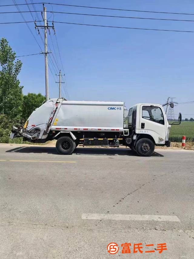 Newly arrived 5080 CIMC rear mounted compressed garbage truck, registered in June 2018, with a Jiang